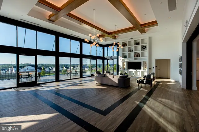 a living room with furniture fireplace and flat screen tv