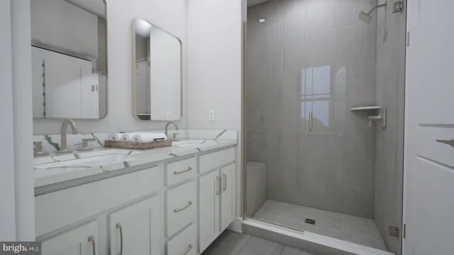 a bathroom with a granite countertop sink mirror and double