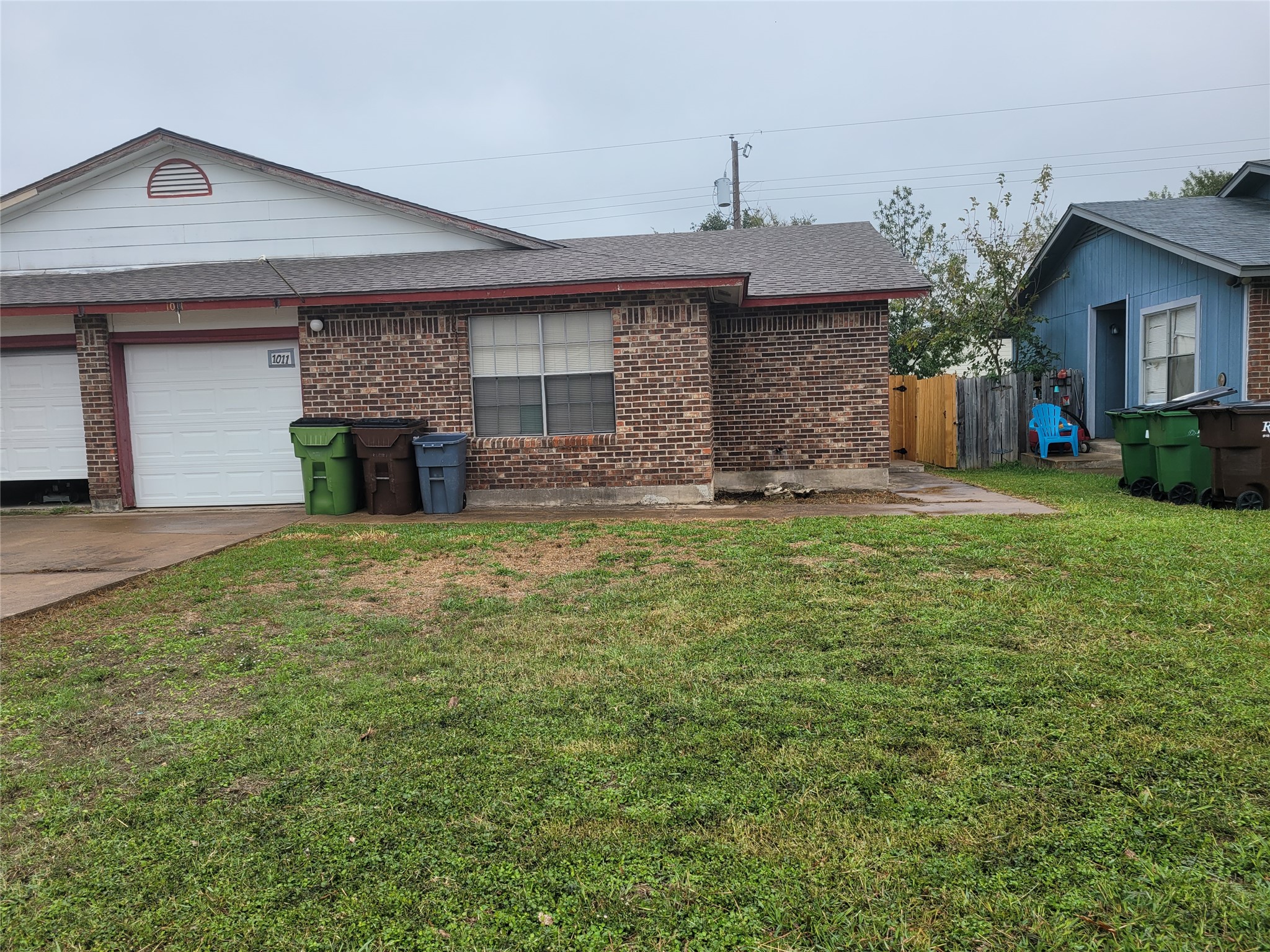 1011 Ridgemont Street Round Rock, TX 78664 - Photo 14 of 14 a view of a house with a yard