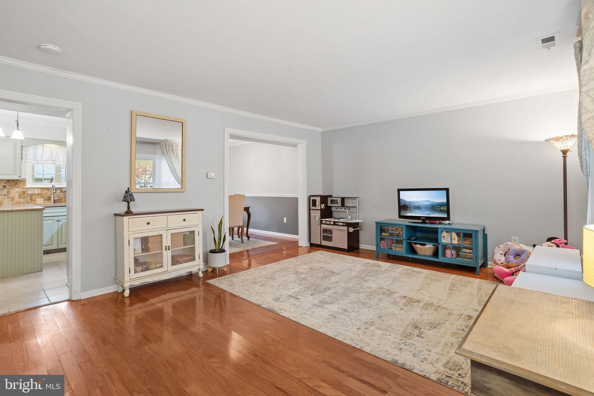 36 Whitechapel Drive Mount Laurel, NJ 08054 - Photo 7 of 36 a living room with furniture and a flat screen tv