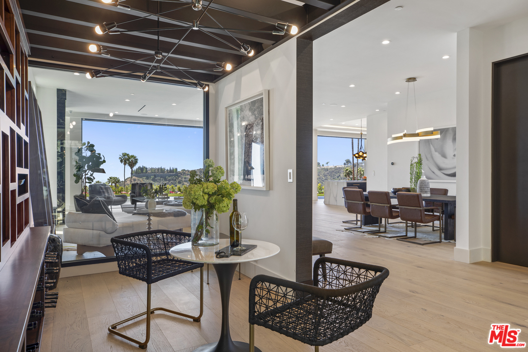 1754 Clear View Drive Beverly Hills, CA 90210 - Photo 13 of 37 a living room with furniture and wooden floor