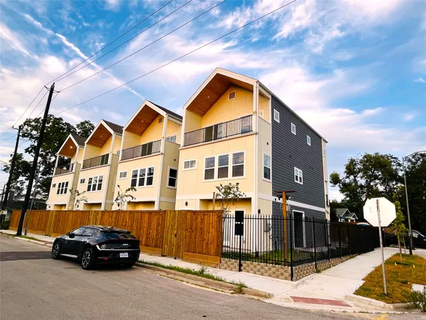 a car parked in front of a house