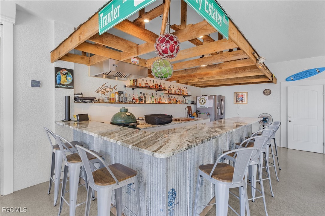 2265 York Road St. James City, FL 33956 - Photo 1 of 39 a view of a dining room with furniture and wooden floor