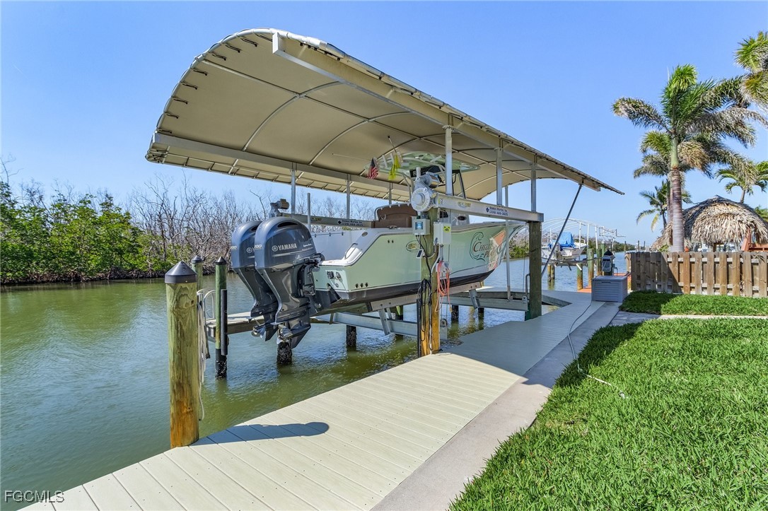 2265 York Road St. James City, FL 33956 - Photo 32 of 39 a view of a swimming pool with a patio