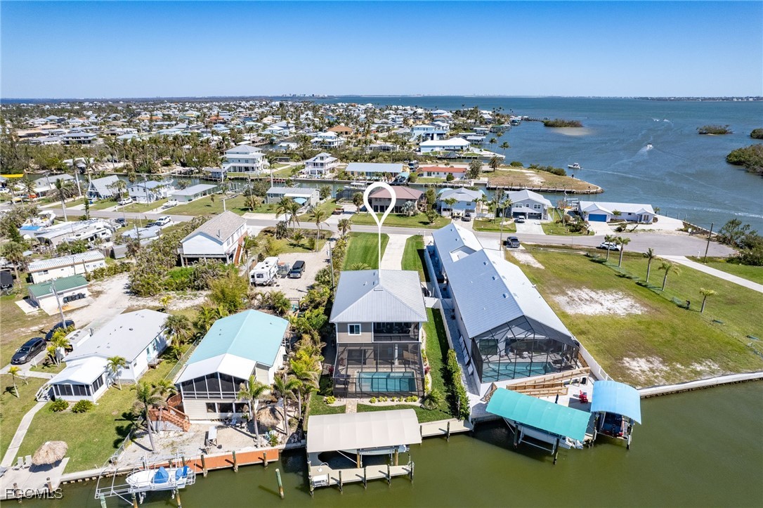 2265 York Road St. James City, FL 33956 - Photo 4 of 39 an aerial view of residential houses with outdoor space