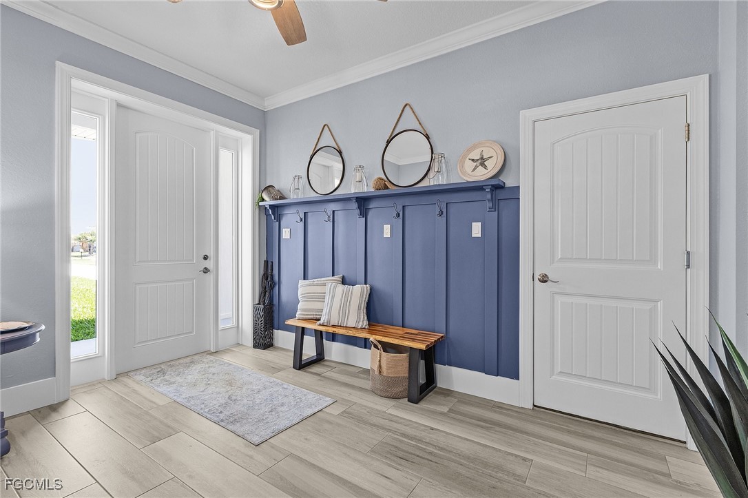2265 York Road St. James City, FL 33956 - Photo 8 of 39 a view of a room with wooden floor and front door