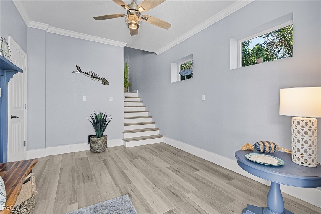 2265 York Road St. James City, FL 33956 - Photo 9 of 39 a view of a livingroom with furniture and wooden floor