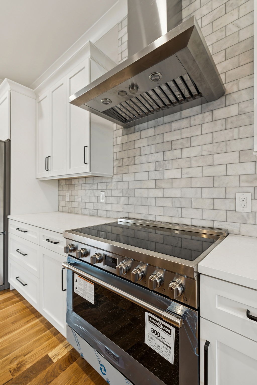 8297 12 Corners Road Lascassas, TN 37085 - Photo 15 of 63 a stove top oven sitting inside of a kitchen
