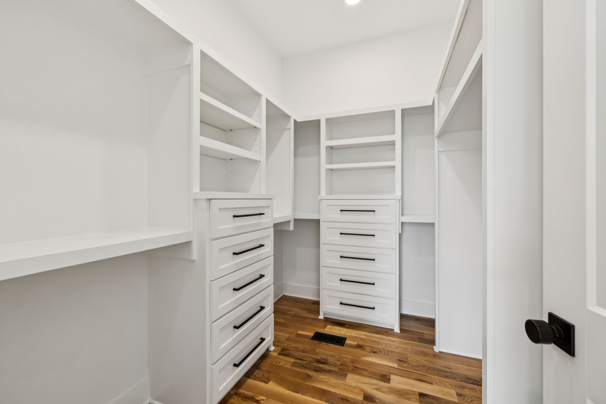 8297 12 Corners Road Lascassas, TN 37085 - Photo 28 of 63 a view of walk in closet with empty racks