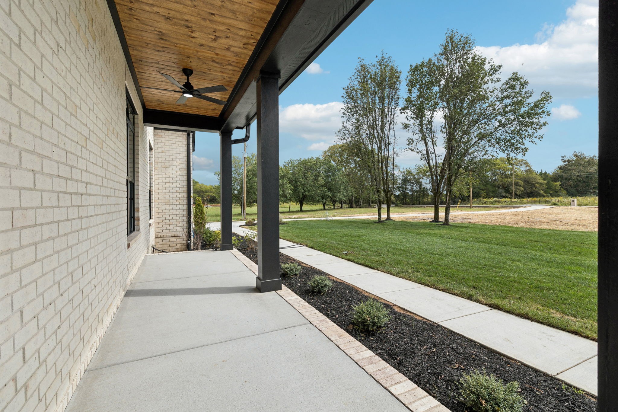 8297 12 Corners Road Lascassas, TN 37085 - Photo 4 of 63 a garden view with a garden