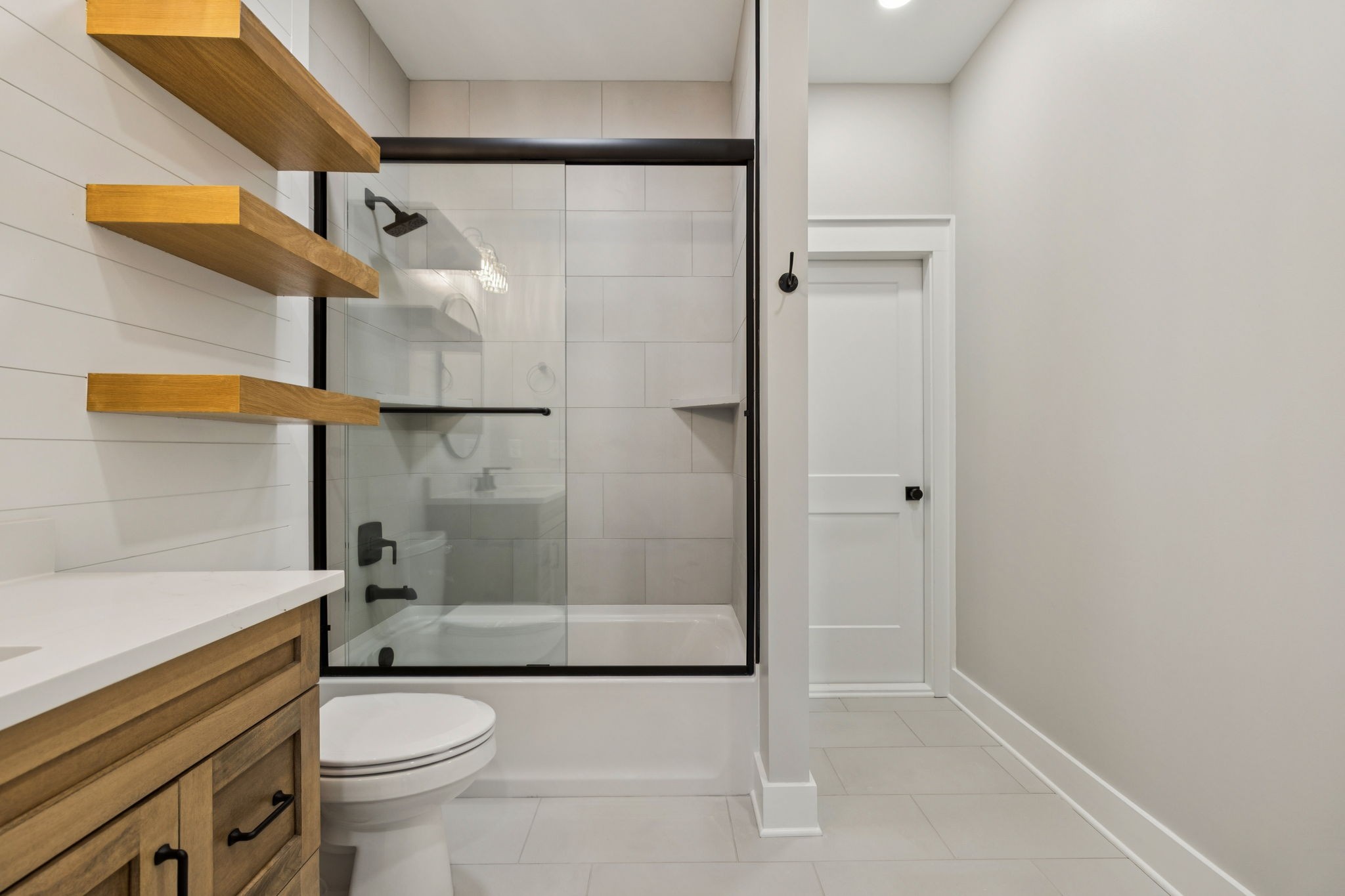 8297 12 Corners Road Lascassas, TN 37085 - Photo 46 of 63 a bathroom with a shower a toilet and sink