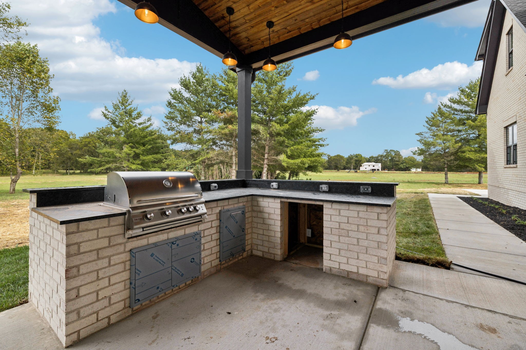 8297 12 Corners Road Lascassas, TN 37085 - Photo 54 of 63 a view of kitchen with washer and dryer