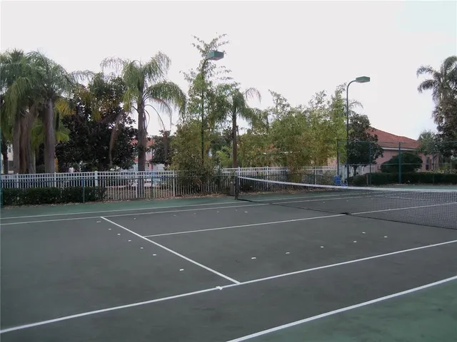 a living room with furniture kitchen view and a dining table