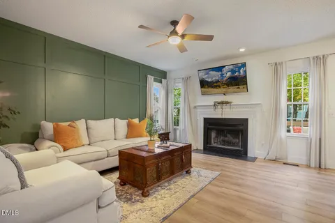 a view of a room with a table and chairs