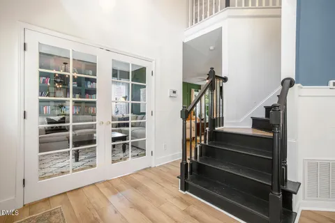 a bedroom with a bed and dresser