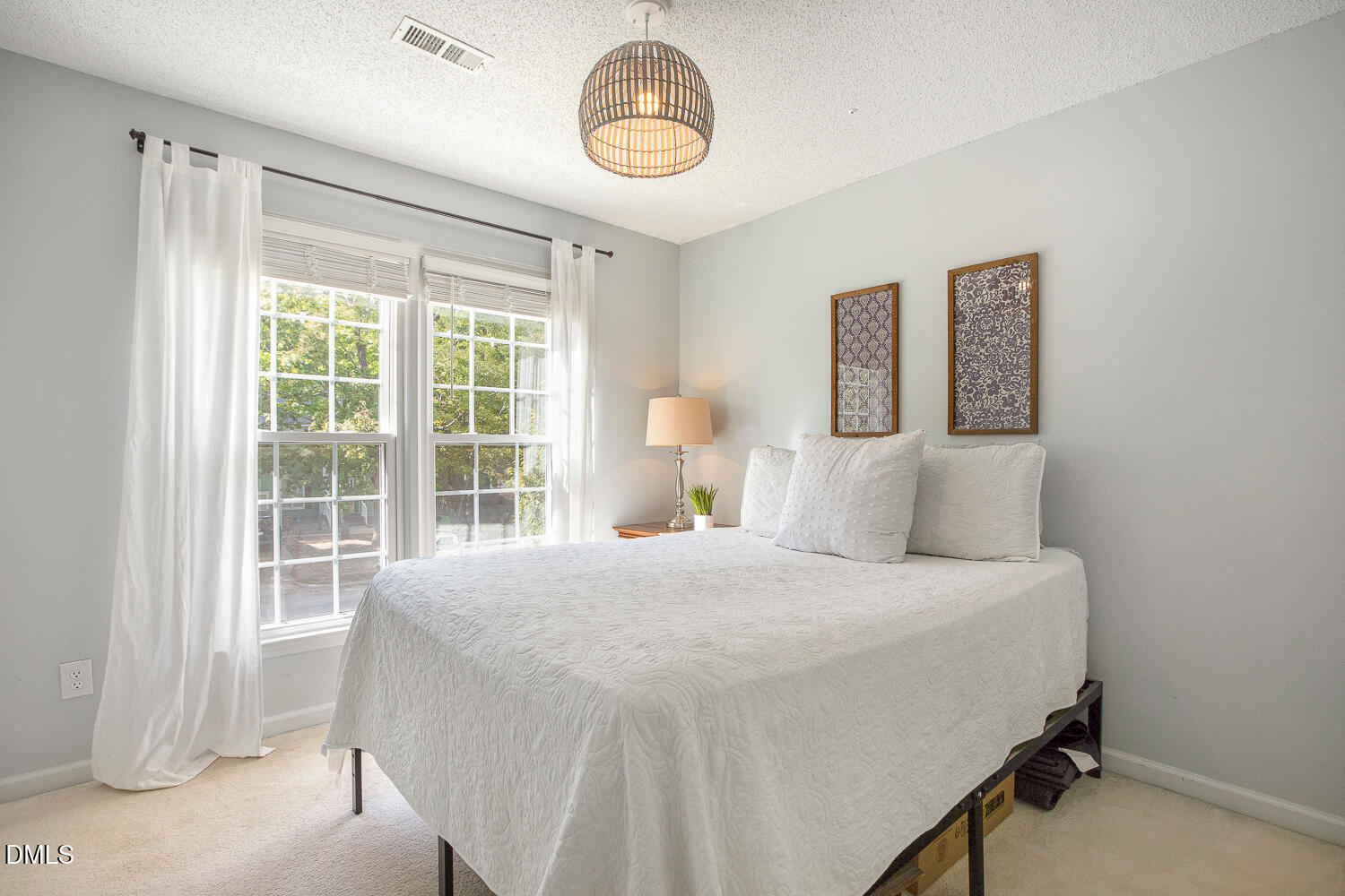 5233 Fairmead Circle Raleigh, NC 27613 - Photo 46 of 68 a bedroom with a bed and a window