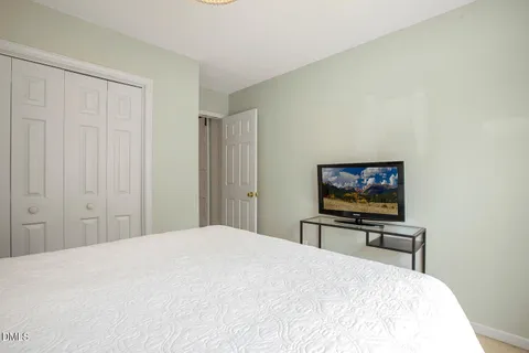 a view of a swimming pool with a yard