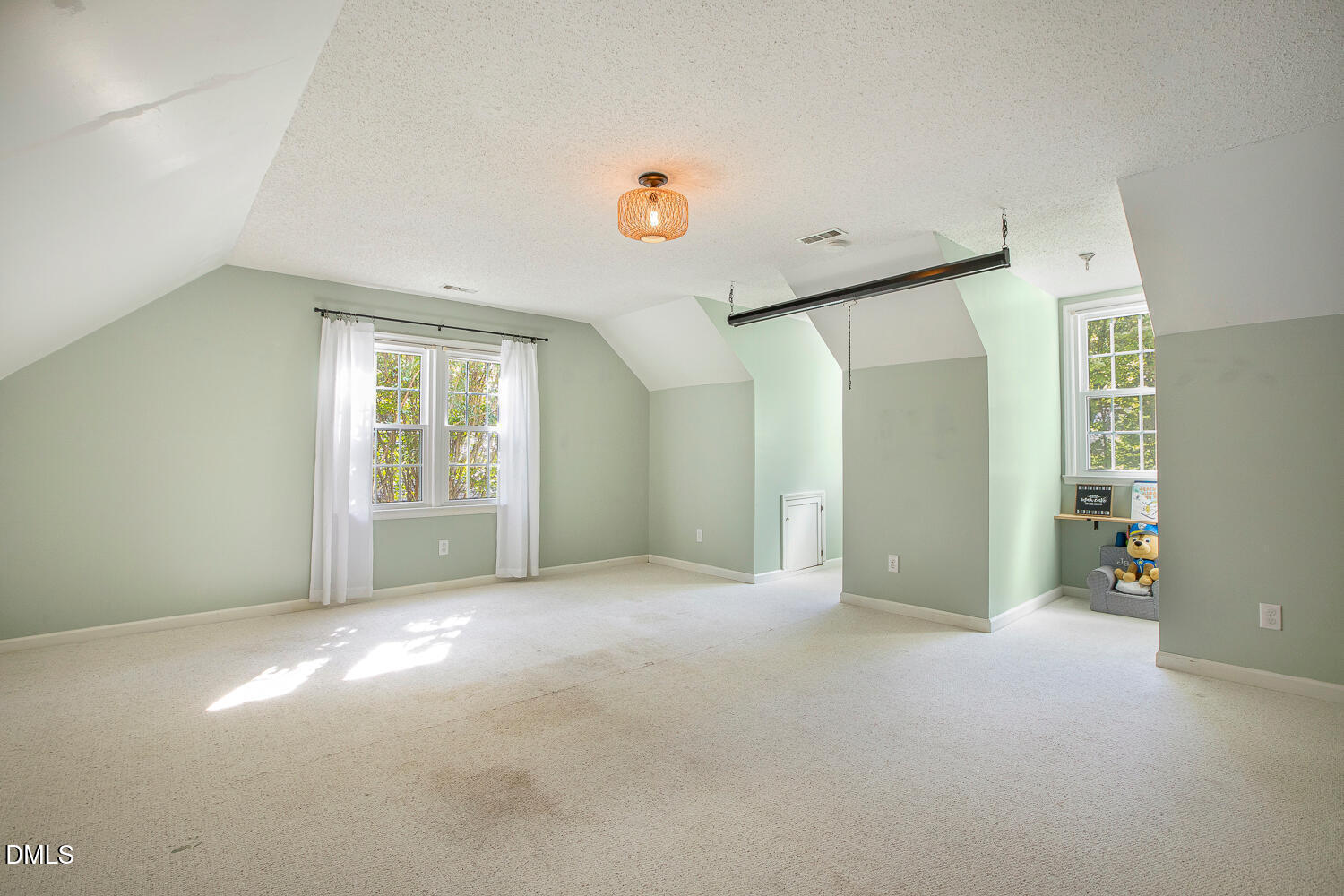 5233 Fairmead Circle Raleigh, NC 27613 - Photo 49 of 68 an empty room with windows & cabinet