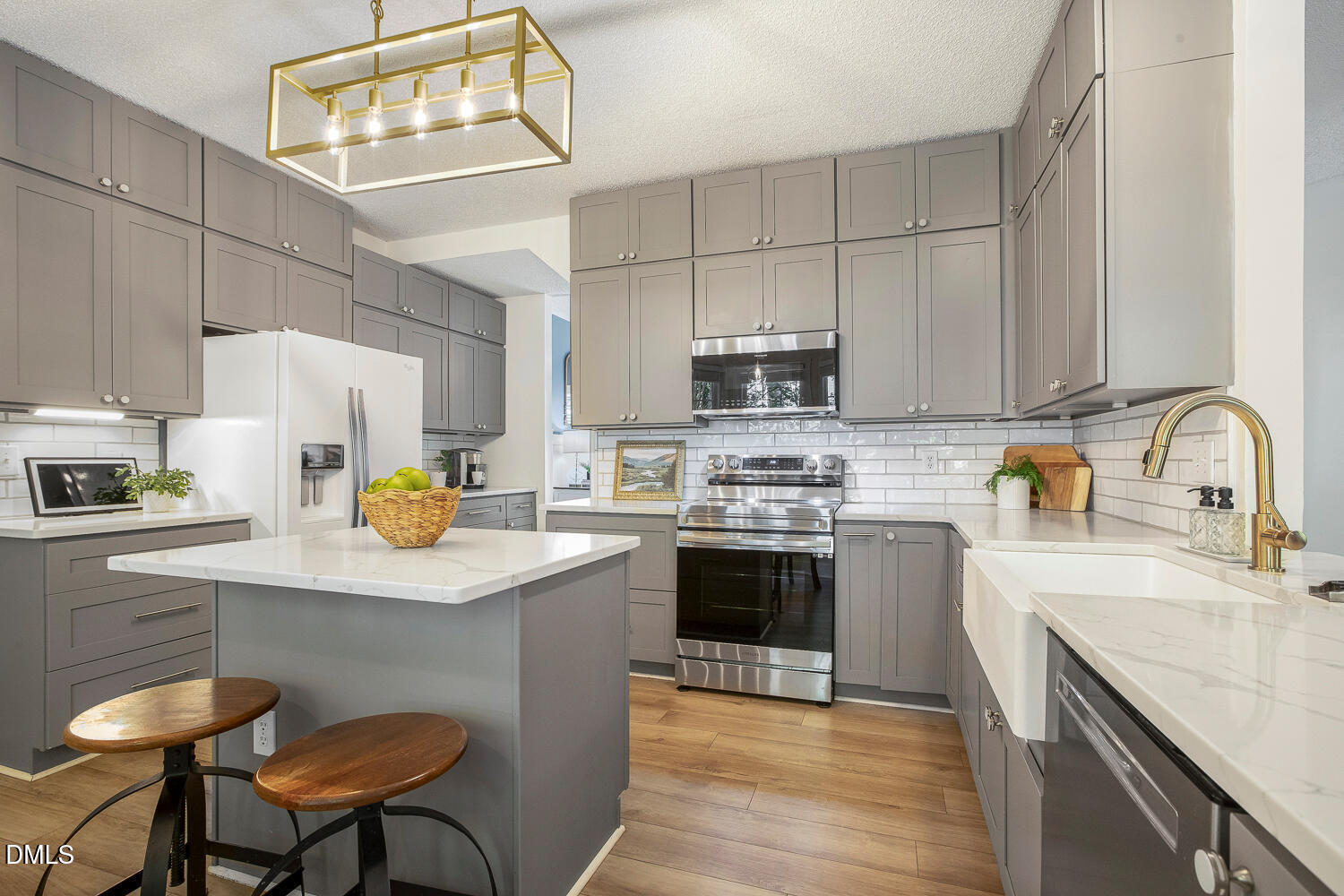 5233 Fairmead Circle Raleigh, NC 27613 - Photo 7 of 68 a kitchen with a sink cabinets and appliances
