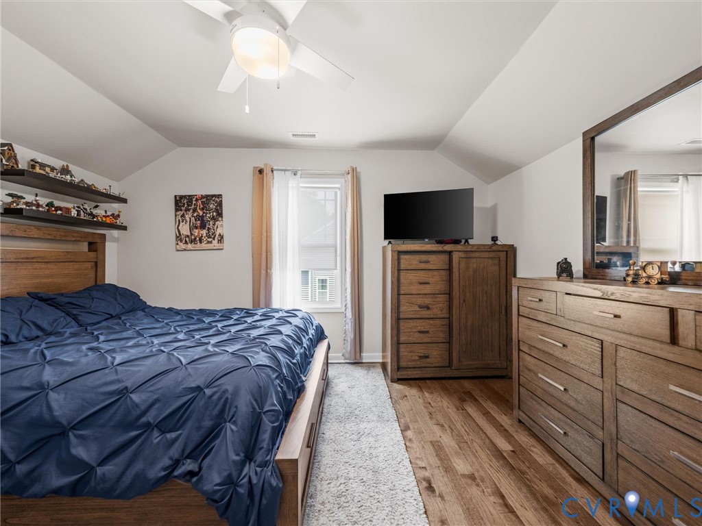 10824 Avening Road Chesterfield, VA 23832 - Photo 33 of 47 a bedroom with a bed and a flat screen tv