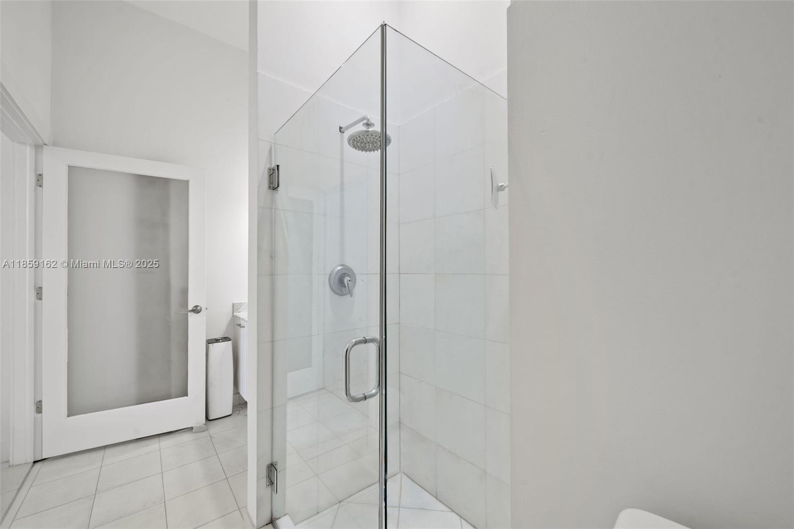 2001 Meridian Avenue, Unit 103 Miami Beach, FL 33139 - Photo 25 of 49 a bathroom with a shower