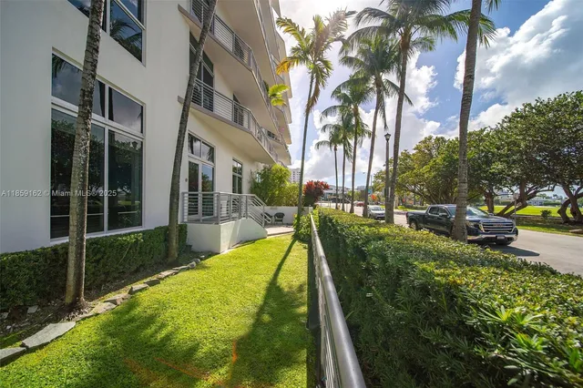 a view of a house with a yard balcony