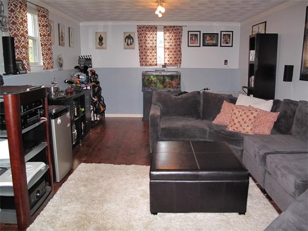 33 Edgewood Road Holbrook, MA 02343 - Photo 14 of 24 a living room with furniture and a flat screen tv