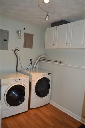 33 Edgewood Road Holbrook, MA 02343 - Photo 18 of 24 a utility room with sink dryer and washer