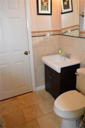 33 Edgewood Road Holbrook, MA 02343 - Photo 19 of 24 a bathroom with a sink and a toilet