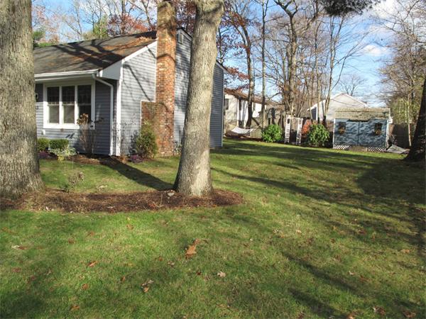 33 Edgewood Road Holbrook, MA 02343 - Photo 23 of 24 a view of a house with a yard