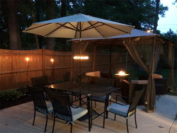 33 Edgewood Road Holbrook, MA 02343 - Photo 24 of 24 a view of a backyard with furniture and a umbrella