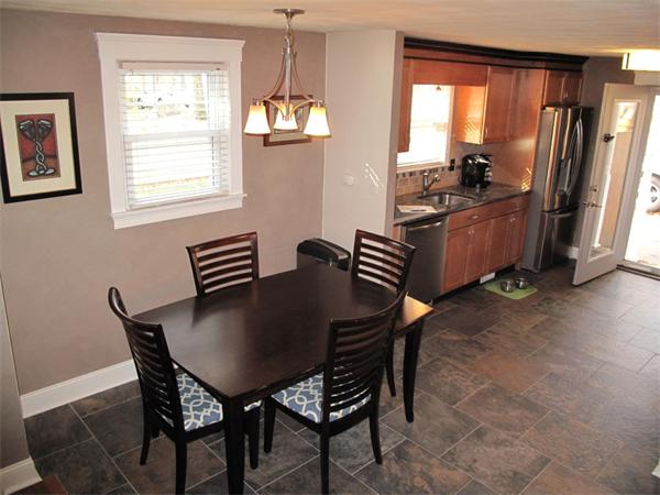 33 Edgewood Road Holbrook, MA 02343 - Photo 5 of 24 a view of a dining room with furniture window and outside view