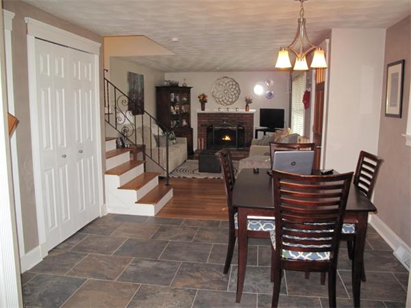 33 Edgewood Road Holbrook, MA 02343 - Photo 6 of 24 a view of a dining room with furniture and a chandelier