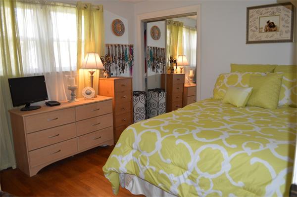 33 Edgewood Road Holbrook, MA 02343 - Photo 10 of 24 a bedroom with a bed and window
