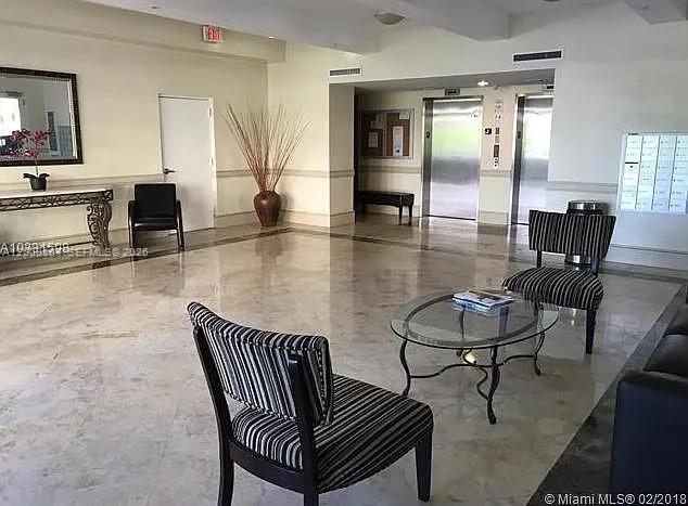 2400 Southwest 27th Avenue, Unit 304 Miami, FL 33145 - Photo 16 of 18 a view of a livingroom and dining room