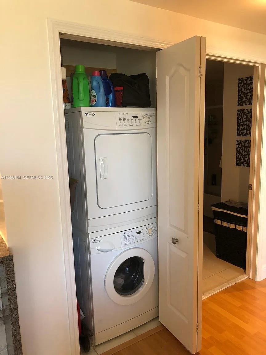 2400 Southwest 27th Avenue, Unit 304 Miami, FL 33145 - Photo 6 of 18 a utility room with dryer and washer