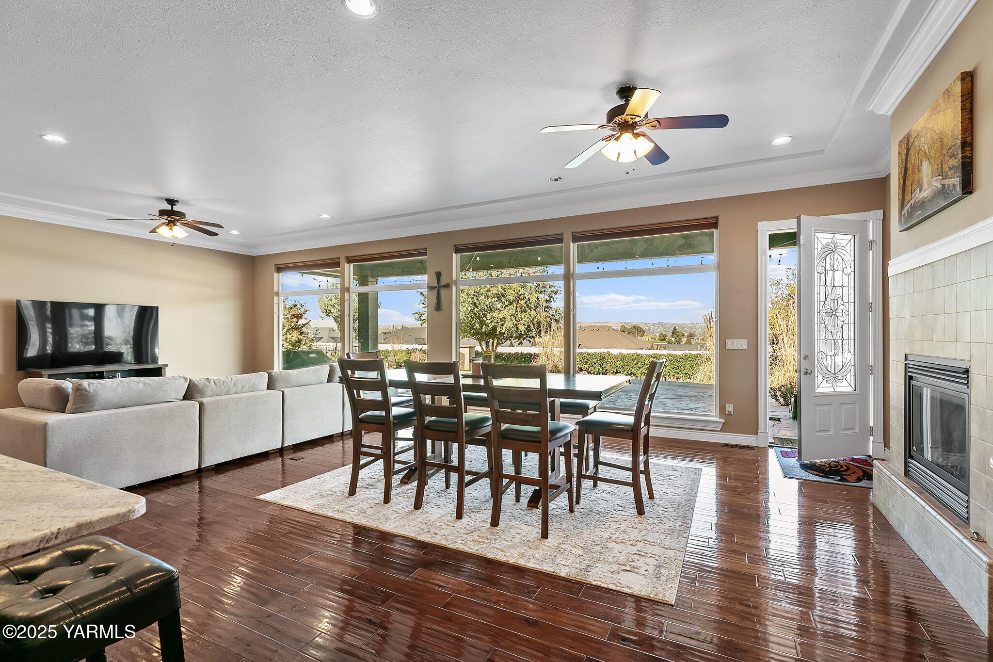 7501 Crestfields Road Yakima, WA 98903 - Photo 12 of 38 a view of a dining room with furniture window and wooden floor