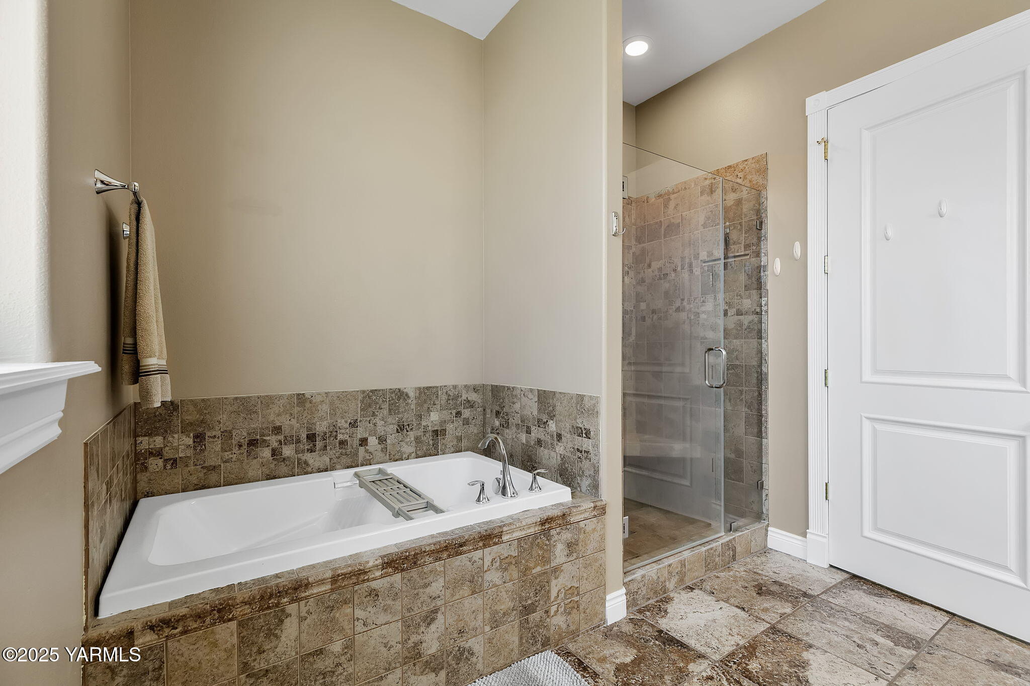 7501 Crestfields Road Yakima, WA 98903 - Photo 24 of 38 a bathroom with a bathtub and shower