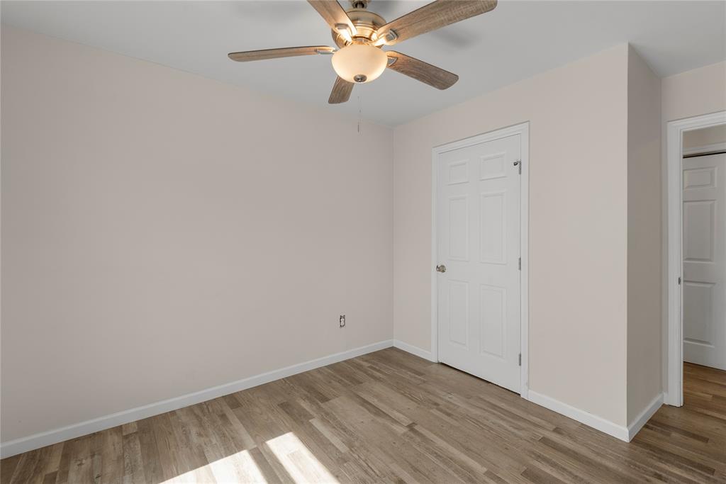 2221 North Alexander Street Sherman, TX 75092 - Photo 15 of 39 wooden floor in an empty room