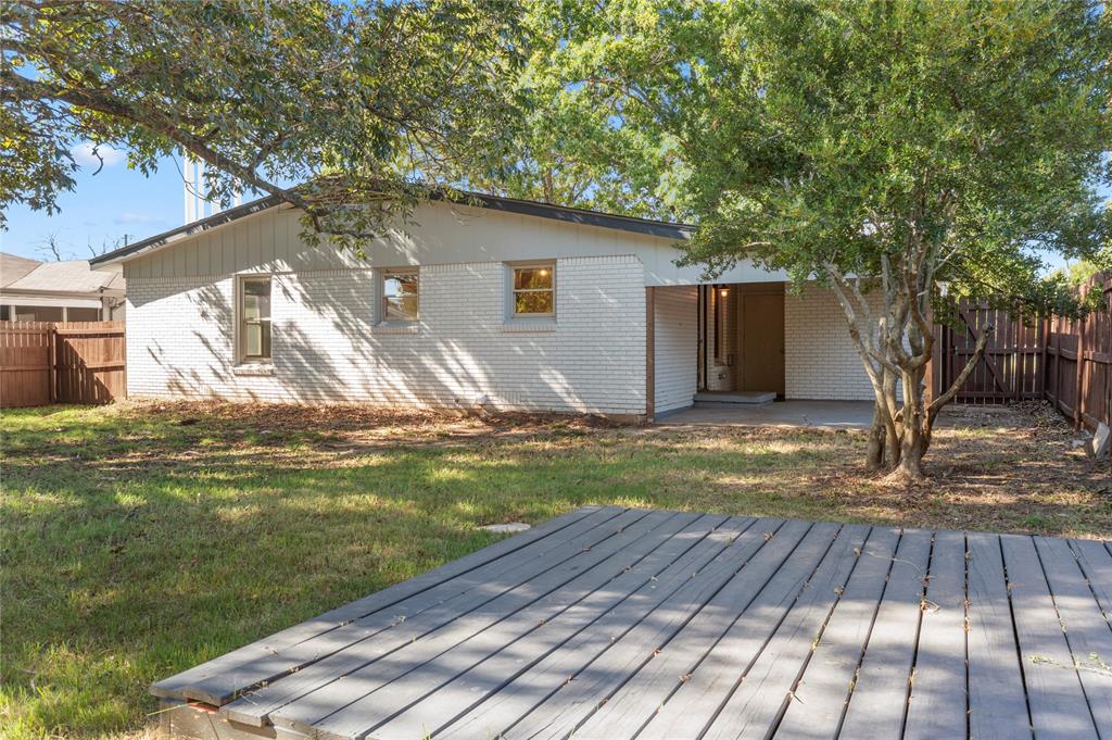 2221 North Alexander Street Sherman, TX 75092 - Photo 28 of 39 a view of a house with a yard