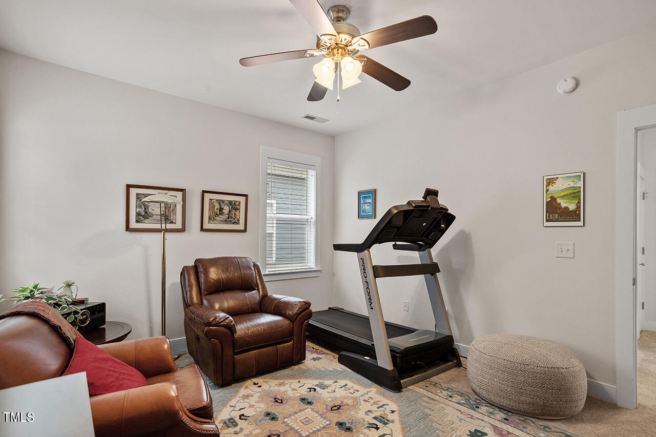4526 All Points View Way Raleigh, NC 27614 - Photo 17 of 25 a living room with furniture and a rug
