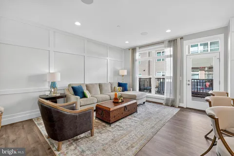 a living room with furniture and a couch