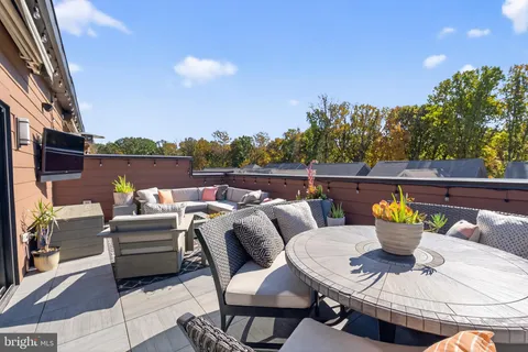 a view of a patio on the roof deck