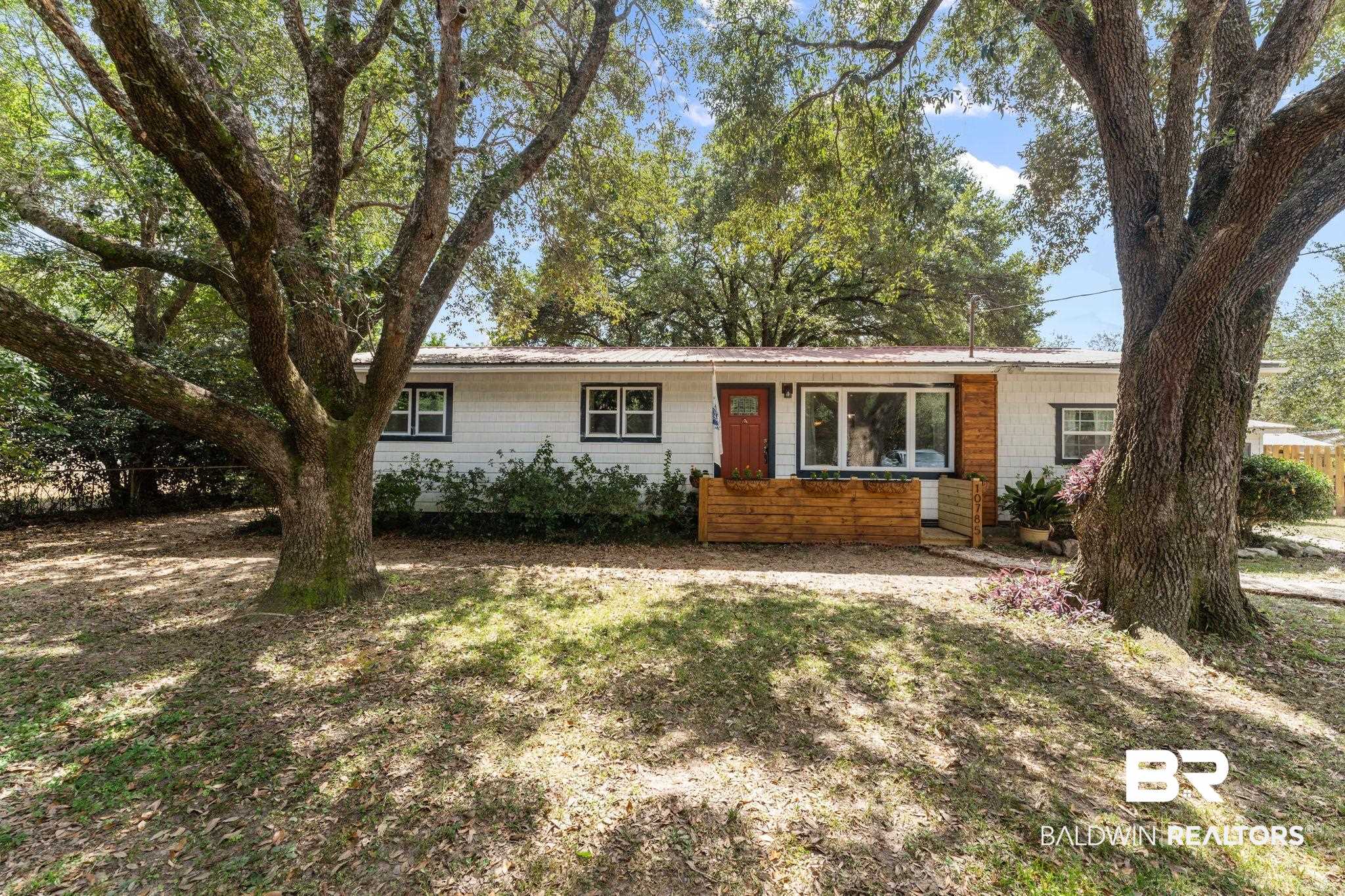 10785 Gregg Road Semmes, AL 36575 - Photo 1 of 35 Ranch-style home featuring a metal roof