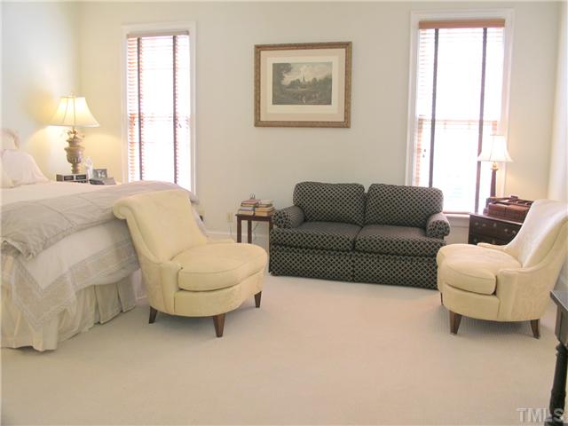 304 Marlowe Road Raleigh, NC 27609 - Photo 18 of 25 a living room with furniture and a large window
