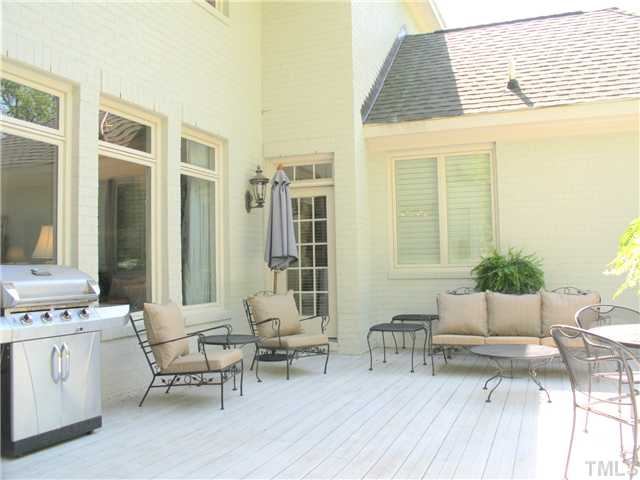 304 Marlowe Road Raleigh, NC 27609 - Photo 23 of 25 a balcony with furniture and a potted plant