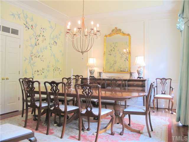 304 Marlowe Road Raleigh, NC 27609 - Photo 6 of 25 a view of a dining room with furniture and chandelier