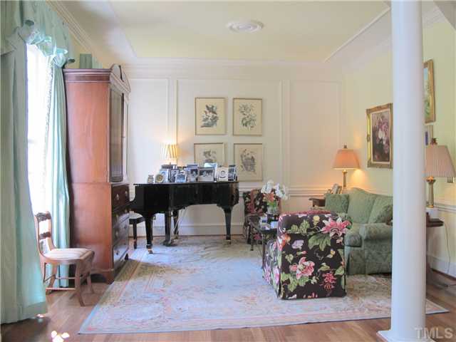 304 Marlowe Road Raleigh, NC 27609 - Photo 8 of 25 a view of a dining room with furniture and a potted plant