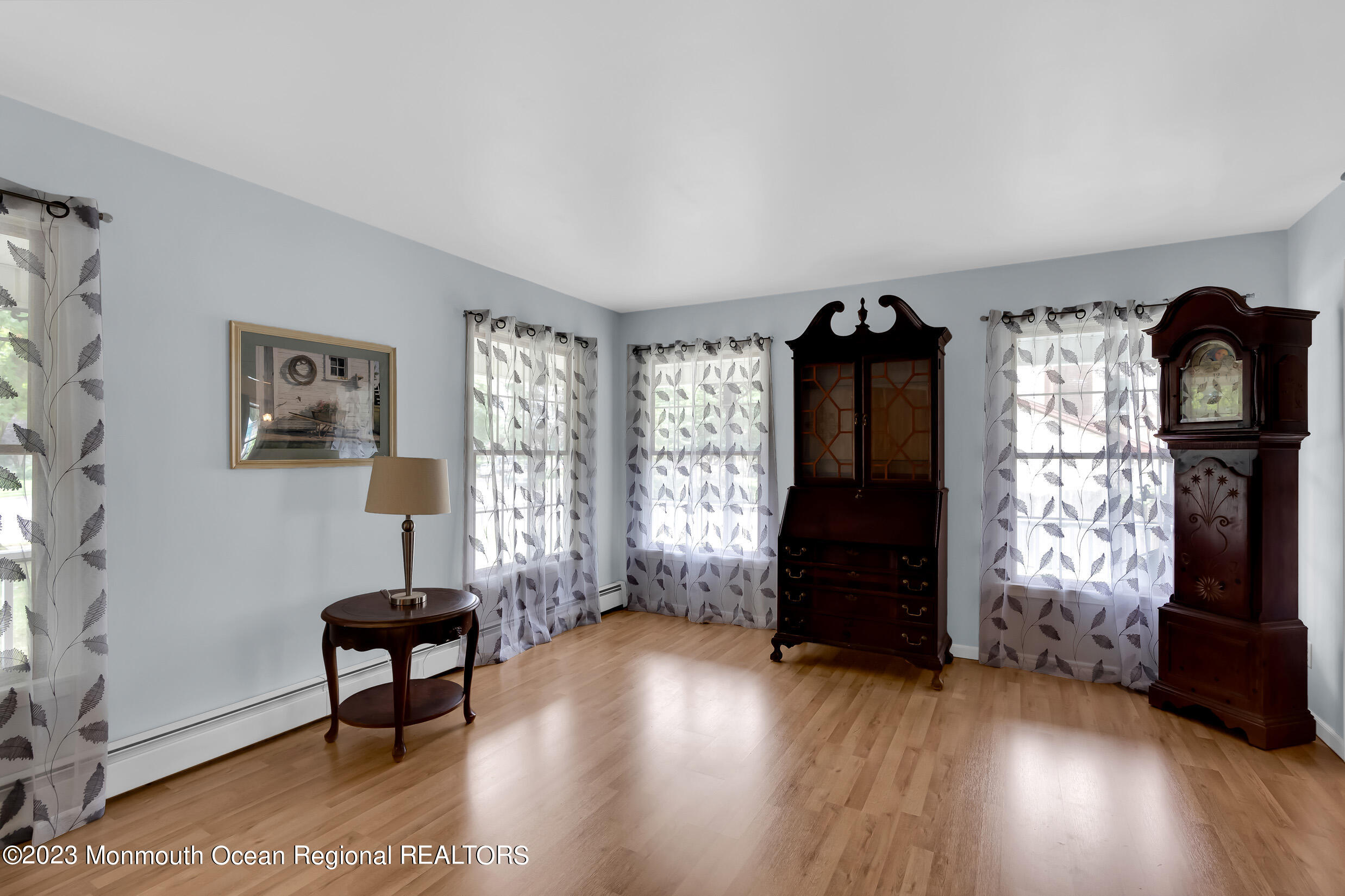 1216 Andover Road Brick, NJ 08724 - Photo 14 of 50 a living room with furniture and a fireplace