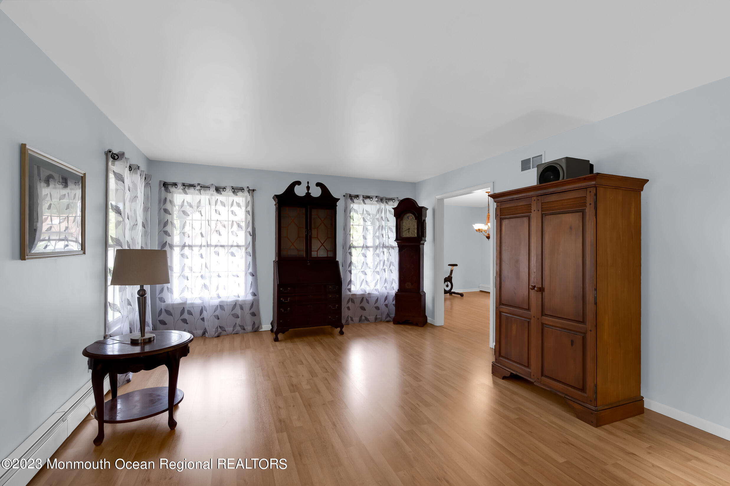 1216 Andover Road Brick, NJ 08724 - Photo 15 of 50 a view of empty room with furniture and wooden floor